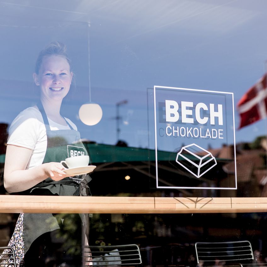 View the window display at BECH Chocolates in the harbor of Gudhjem on Bornholm.