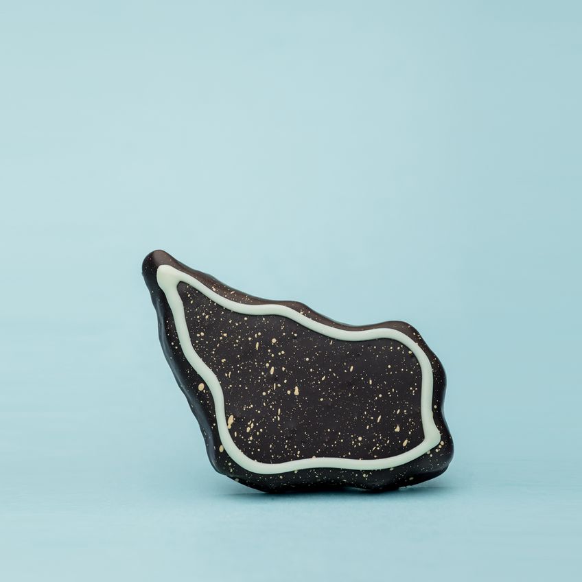 A handmade chocolate bite by BECH Chocolate on Bornholm.