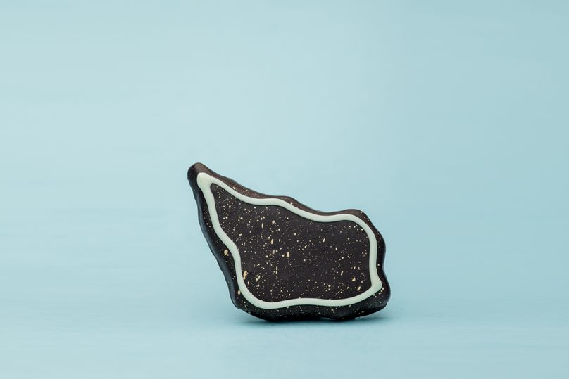 A handmade chocolate bite by BECH Chocolate on Bornholm.